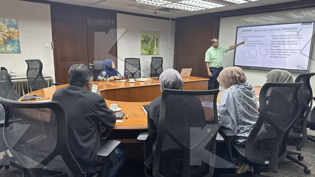 The trainer explains a brand slide in a Kognifi Brand Strategy and Storytelling class