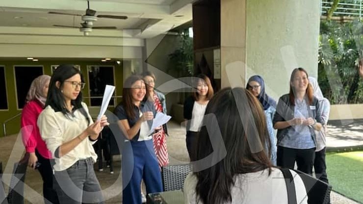 Participants in an outdoor communication activity in a Kognifi Business Communication Skills class