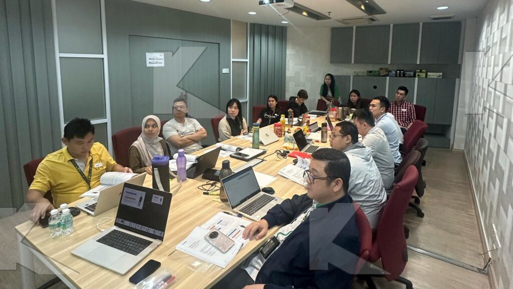 Participants prepare for a negotiation role play in an in-house Kognifi Sales Negotiation class
